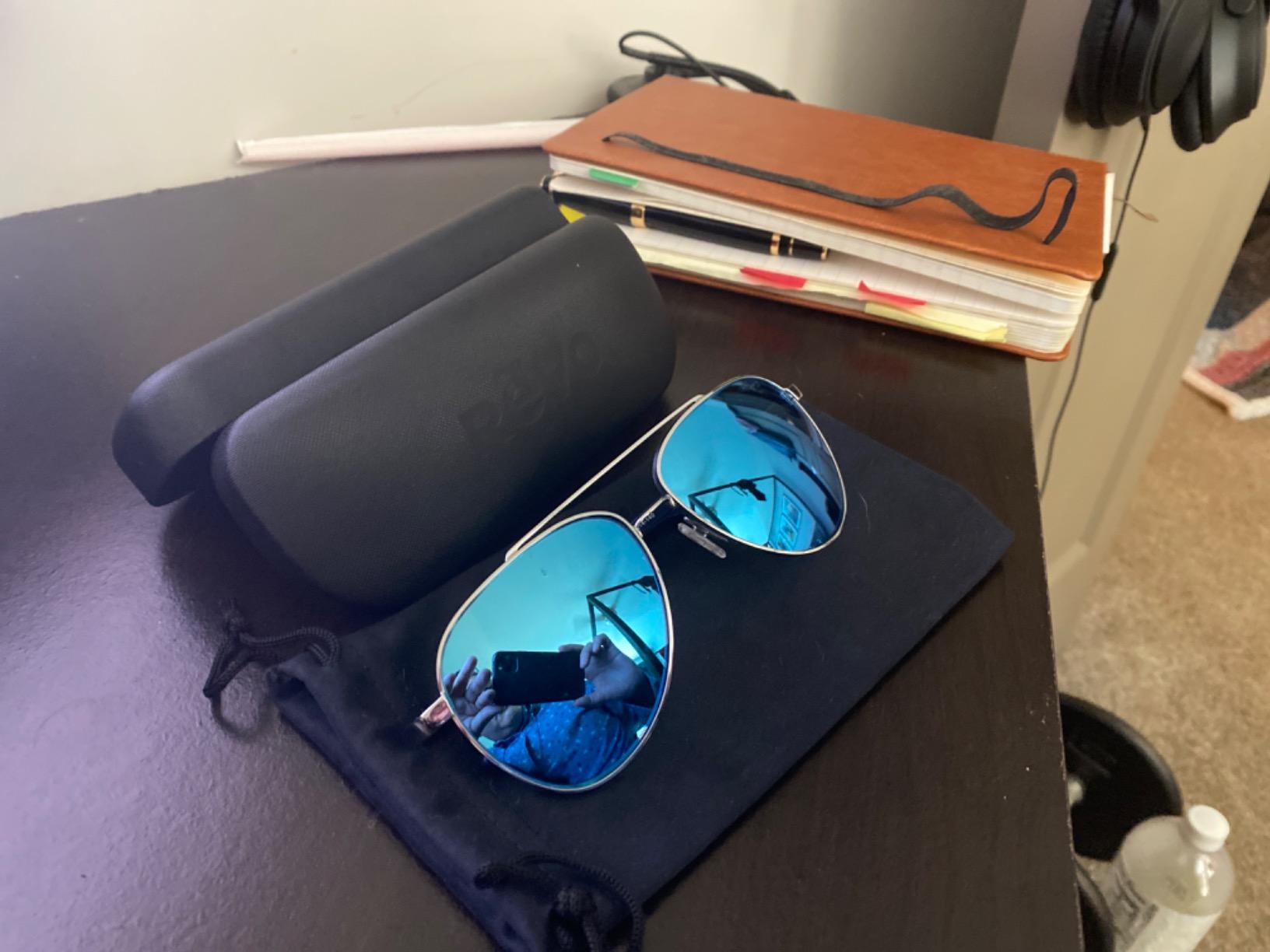 Revo Sunglasses Jasper: Polarized Crystal Glass Lens with Large Rectangle Wrap Frame, Matte Black Frame with Revo H20 Blue Lens - Customer Photo 1