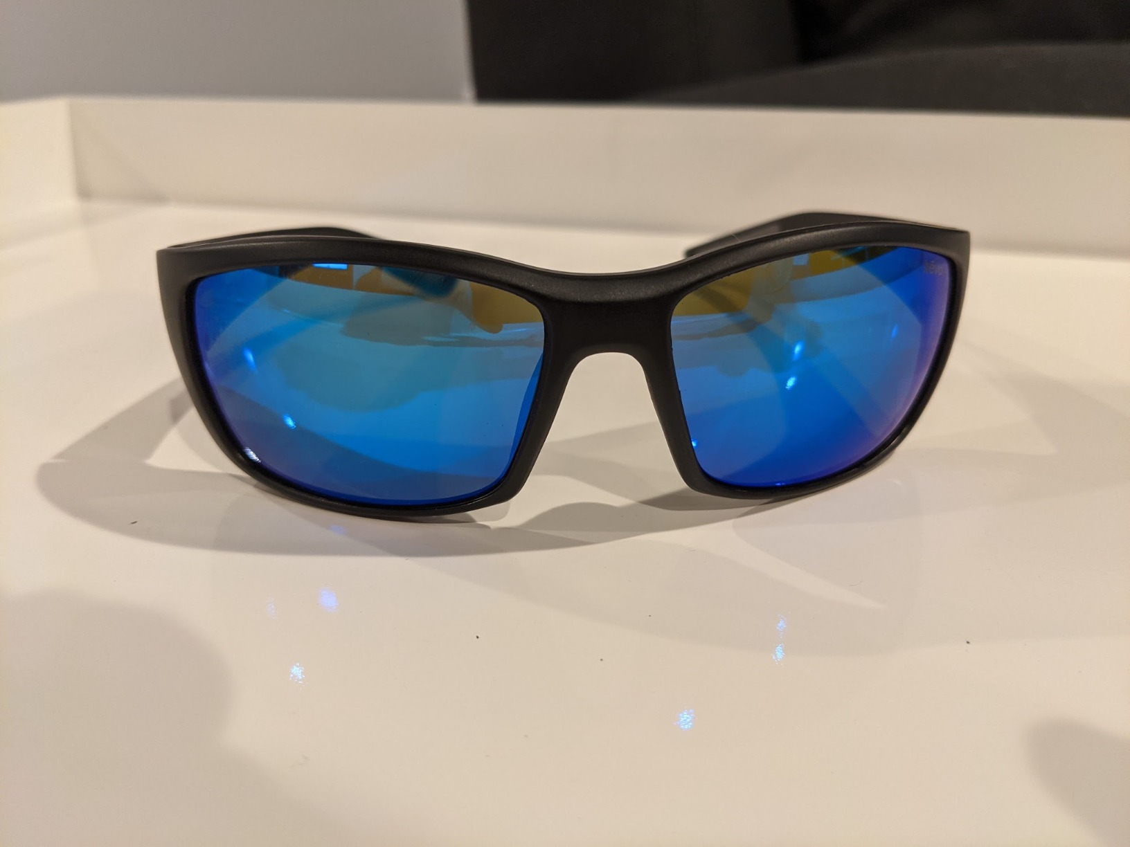 Revo Sunglasses Jasper: Polarized Crystal Glass Lens with Large Rectangle Wrap Frame, Matte Black Frame with Revo H20 Blue Lens - Customer Photo 2