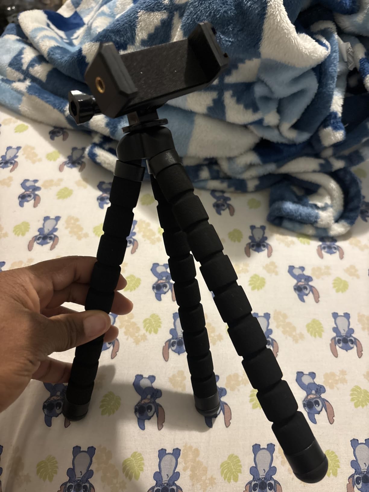 Amazon Basics Portable and Flexible Tripod with Wireless Remote and Smartphone Clamp, 10-inch long, Black - Customer Photo 1
