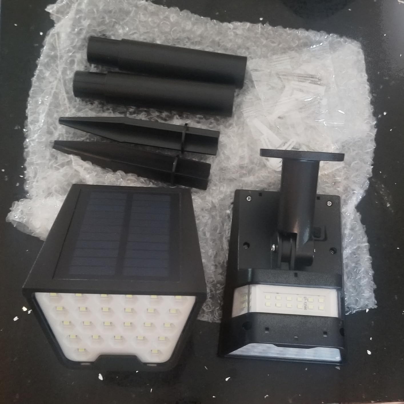 Solar Spot Lights Outdoor IP65 Waterproof, 53 LEDs Solar Powered Garden Yard Lights Outdoor 3 Modes Landscape Spotlight Wall Light with Auto On/Off for Driveway Porch 2 Pack (Cool White) Customer Review Solar Spot Lights Outdoor IP65 Waterproof, 53 LEDs Solar Powered Garden Yard Lights Outdoor 3 Modes Landscape Spotlight Wall Light with Auto On/Off for Driveway Porch 2 Pack (Cool White) - Customer Photo 1