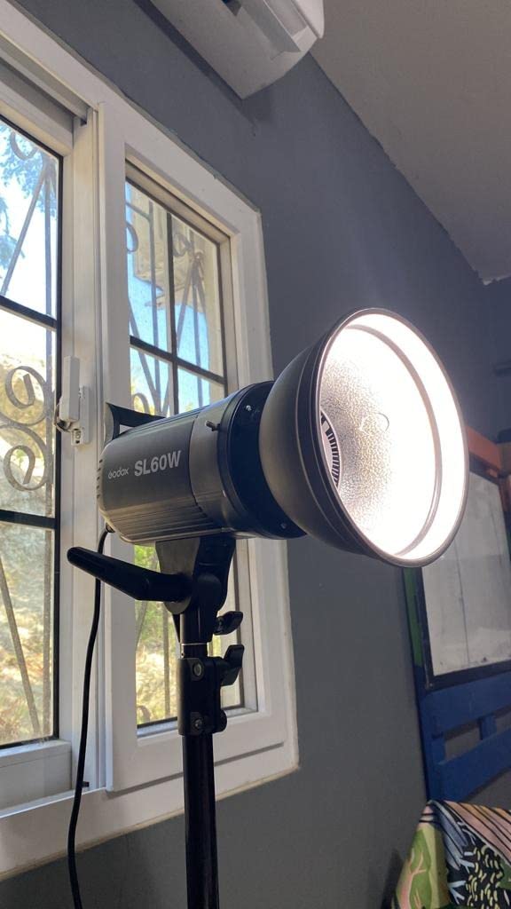 Godox SL-60W SL60W Daylight Led Video Light, 5600K Bright Studio Led Light, CRI95+Qa>90,Wirelessly Adjust Brightness,Bowens Mount LED Continuous Light for Video Recording Wedding Outdoor Photography customer photo 1″ class=”wp-image-customer”/></figure>


<p>Heat management is handled by a premium heatsink and a built-in fan with temperature control. During a six-hour product photography session, the fan stayed quiet enough that it did not interfere with my audio recording at a distance of about 6 feet. The large LCD panel shows brightness settings and auto-saves your last configuration.</p>

<p>The main trade-off is the fixed 5600K daylight color temperature. You cannot adjust the Kelvin output, so this light is best paired with daylight-balanced setups or used with color correction gels. Some users have reported that the advertised remote is not always included, so check the package contents when it arrives.</p>


<figure class=